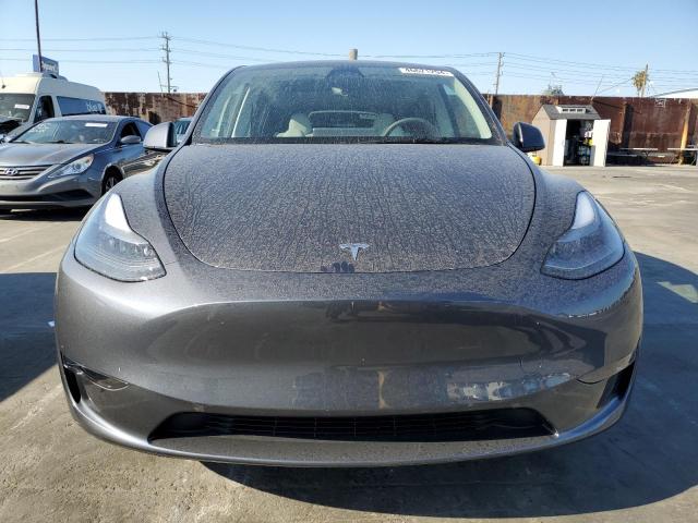 Photo 5 from auction – 2023 TESLA MODEL Y with VIN 7SAYGDED7PF949576