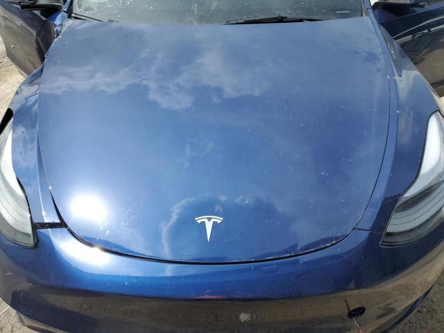 Photo 12 from auction – 2023 TESLA MODEL Y with VIN 7SAYGAEE3PF847182