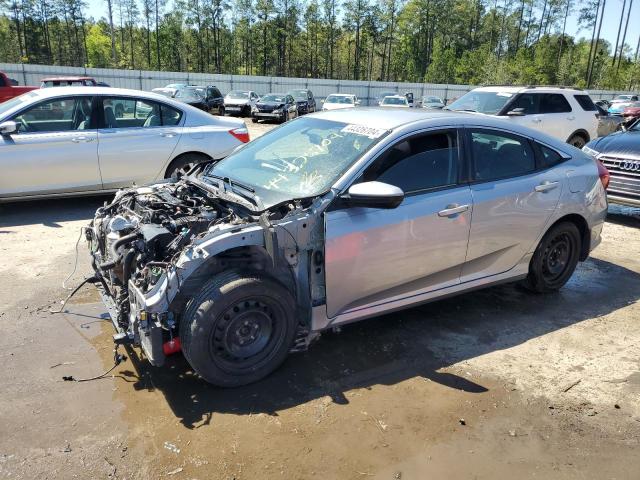 HONDA CIVIC LX 2018 with VIN 2HGFC2F59JH516890 - Photo from auction