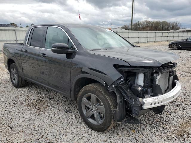 Photo 4 from auction – 2023 HONDA RIDGELINE with VIN 5FPYK3F51PB047641