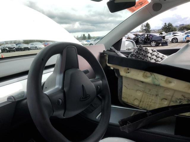 Photo 9 from auction – 2022 TESLA MODEL Y with VIN 7SAYGDEF2NF488608