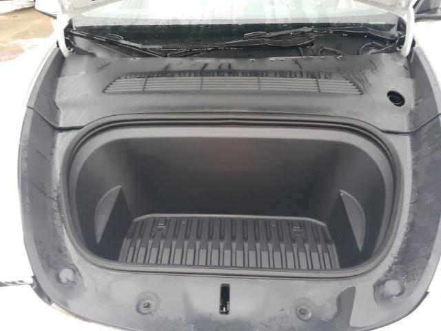 Photo 11 from auction – 2023 TESLA MODEL Y with VIN 7SAYGDEE8PA090309