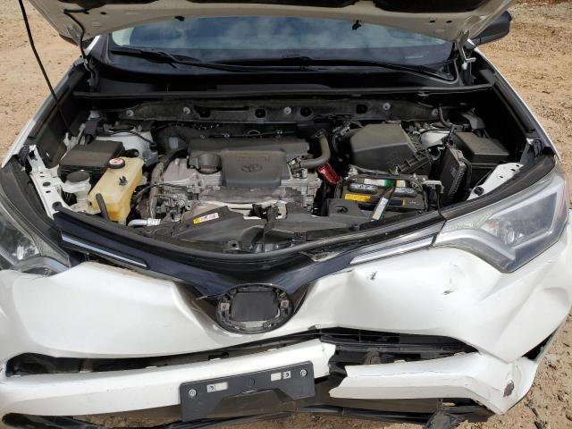 Photo 12 from auction – 2018 TOYOTA RAV4 LE with VIN JTMZFREV7JJ197873