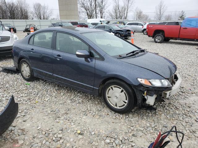 Photo 4 from auction – 2010 HONDA CIVIC HYBR with VIN JHMFA3F22AS006579