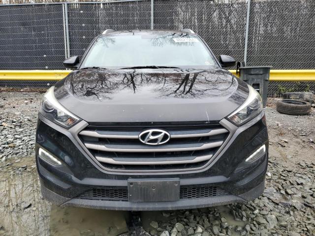 Photo 5 from auction – 2016 HYUNDAI TUCSON LIM with VIN KM8J33A47GU099414