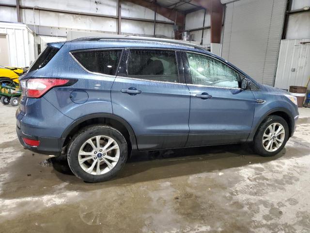 Photo 3 from auction – 2018 FORD ESCAPE SE with VIN 1FMCU9GD9JUC69781