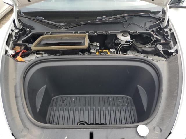 Photo 11 from auction – 2021 TESLA MODEL Y with VIN 5YJYGAEE5MF148810