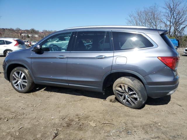 Photo 2 from auction – 2018 HONDA PILOT TOUR with VIN 5FNYF6H98JB008132