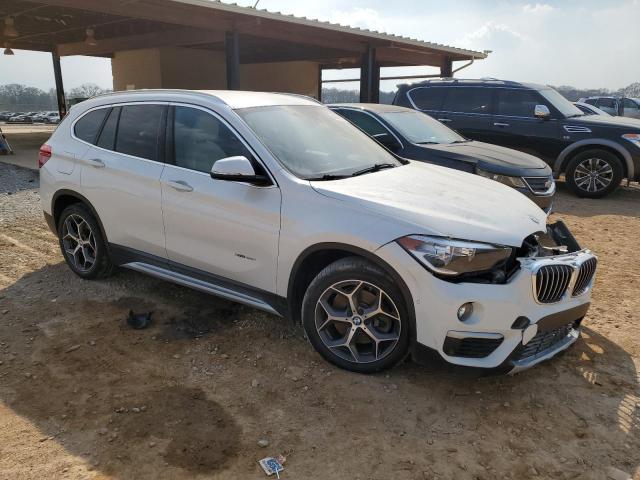 Photo 4 from auction – 2017 BMW X1 XDRIVE2 with VIN WBXHT3C36H5F74026