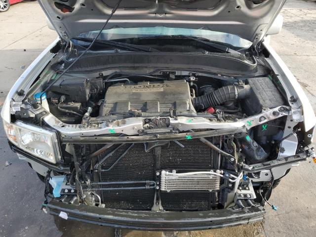Photo 11 from auction – 2014 HONDA RIDGELINE with VIN 5FPYK1F55EB005734