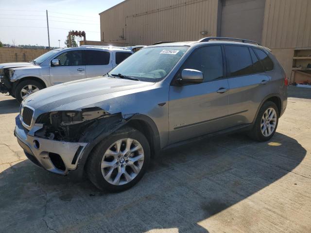 BMW X5 2013 with VIN 5UXZV4C55D0B05955 - Photo from auction