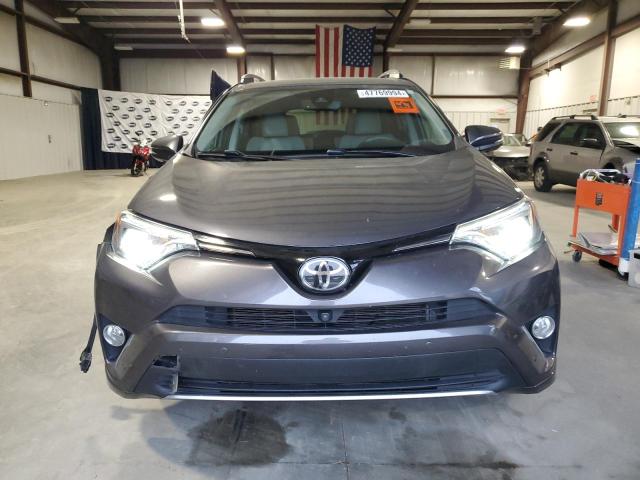 Photo 5 from auction – 2017 TOYOTA RAV4 LIMIT with VIN 2T3DFREVXHW583158