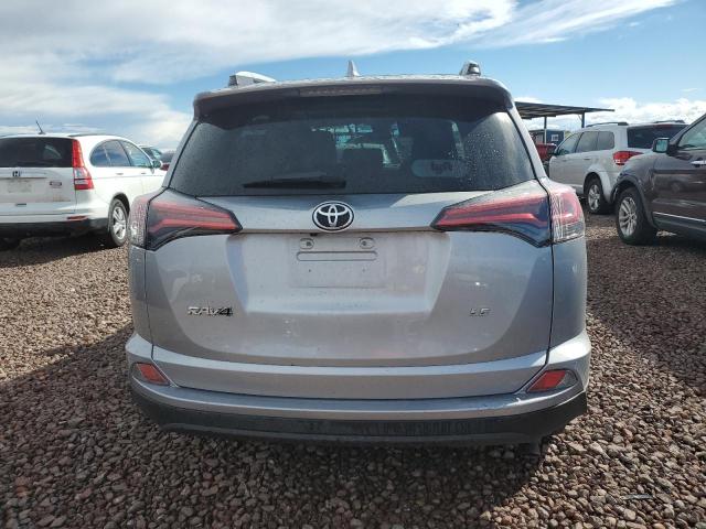 Photo 6 from auction – 2018 TOYOTA RAV4 LE with VIN 2T3ZFREV2JW459722