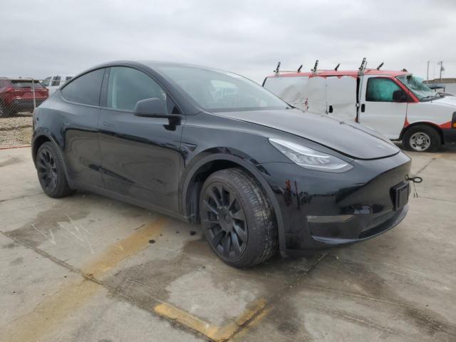 Photo 4 from auction – 2023 TESLA MODEL Y with VIN 7SAYGDEE1PA101490