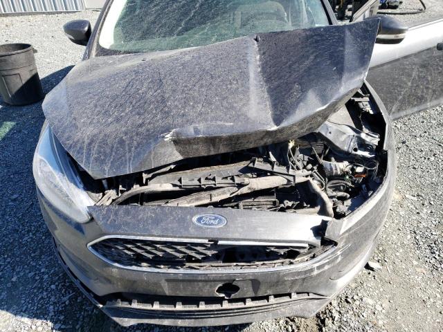 Photo 11 from auction – 2018 FORD FOCUS SE with VIN 1FADP3K21JL218855