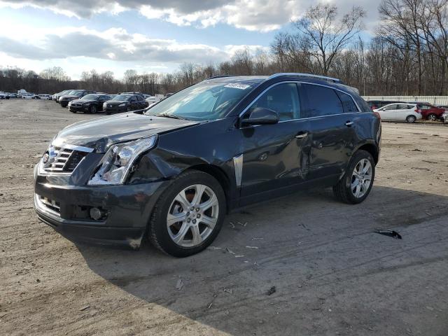 CADILLAC SRX PERFOR 2016 with VIN 3GYFNCE35GS551585 - Photo from auction