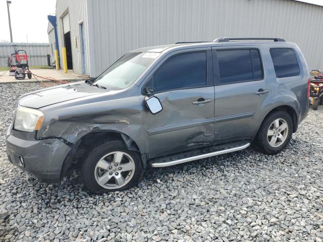 HONDA PILOT EXL 2011 with VIN 5FNYF3H54BB050200 - Photo from auction