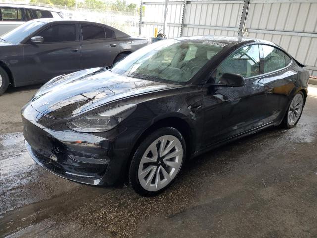 TESLA MODEL 3 2023 with VIN 5YJ3E1EAXPF436503 - Photo from auction