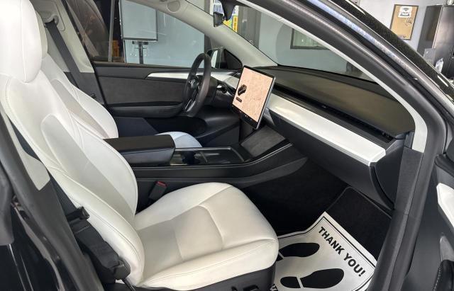 Photo 5 from auction – 2023 TESLA MODEL Y with VIN 7SAYGDEEXPF626051