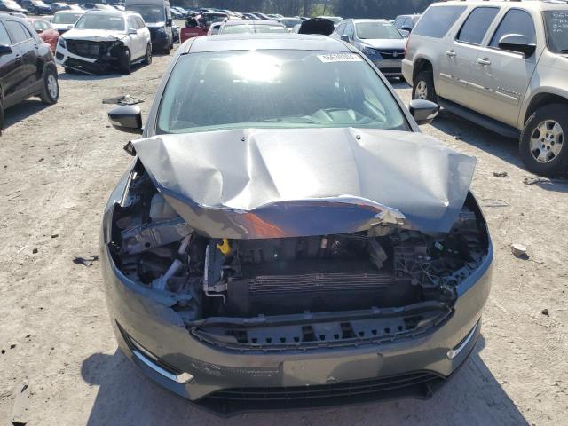Photo 5 from auction – 2017 FORD FOCUS TITA with VIN 1FADP3J26HL302939