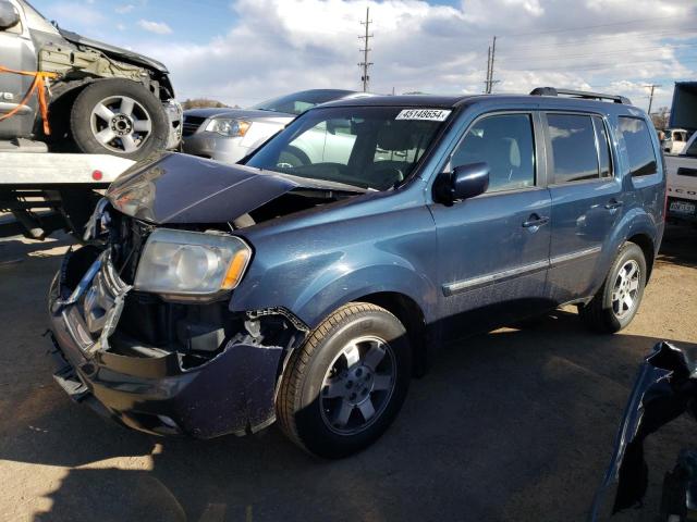 HONDA PILOT TOUR 2011 with VIN 5FNYF4H97BB077402 - Photo from auction