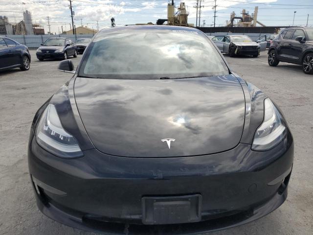 Photo 5 from auction – 2018 TESLA MODEL 3 with VIN 5YJ3E1EA5JF051857