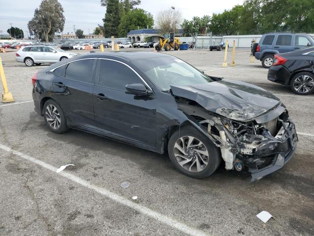 Photo 4 from auction – 2018 HONDA CIVIC EX with VIN 2HGFC2F73JH557498