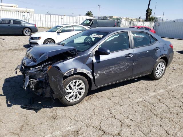 TOYOTA COROLLA L 2019 with VIN 5YFBURHE3KP891802 - Photo from auction