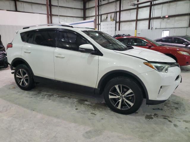 Photo 4 from auction – 2016 TOYOTA RAV4 XLE with VIN 2T3WFREV1GW248345