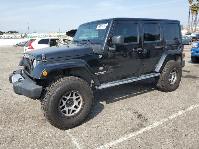 JEEP WRANGLER U 2011 with VIN 1J4BA7H12BL610196 - Photo from auction