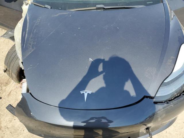 Photo 11 from auction – 2018 TESLA MODEL 3 with VIN 5YJ3E1EA7JF021727