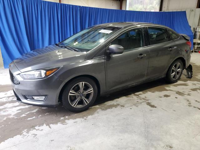 FORD FOCUS SE 2018 with VIN 1FADP3FE4JL257766 - Photo from auction