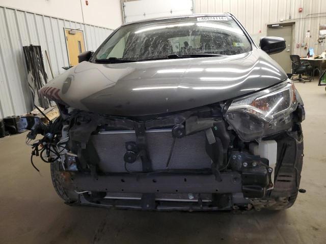 Photo 5 from auction – 2018 TOYOTA RAV4 LE with VIN JTMBFREV7JJ213748