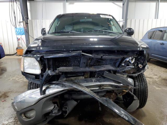 Photo 5 from auction – 2003 FORD F150 with VIN 2FTRX18L23CA62133