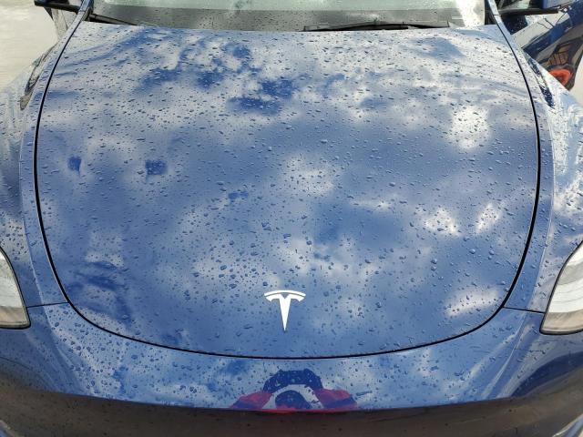 Photo 11 from auction – 2022 TESLA MODEL Y with VIN 7SAYGDEF5NF399731