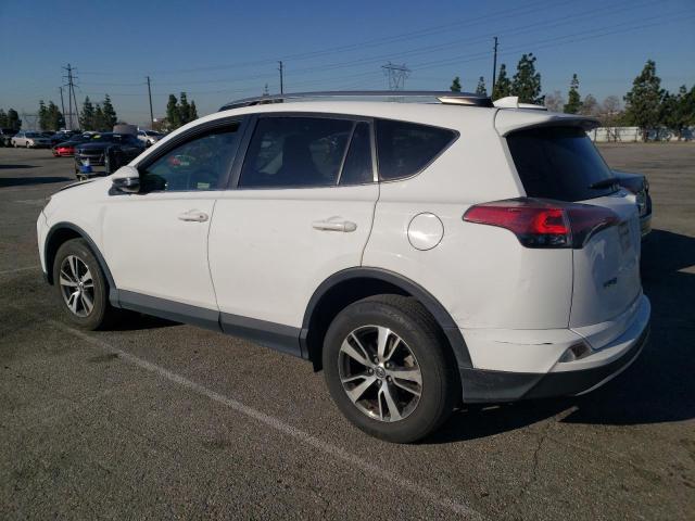 Photo 2 from auction – 2017 TOYOTA RAV4 XLE with VIN JTMWFREV6HD094407