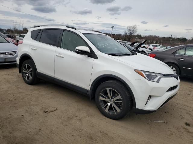 Photo 4 from auction – 2017 TOYOTA RAV4 XLE with VIN JTMRFREV6HD210430