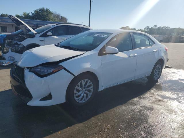 TOYOTA COROLLA L 2017 with VIN 5YFBURHE9HP584532 - Photo from auction
