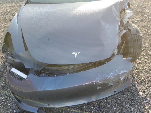 Photo 12 from auction – 2022 TESLA MODEL 3 with VIN 5YJ3E1EB8NF287871
