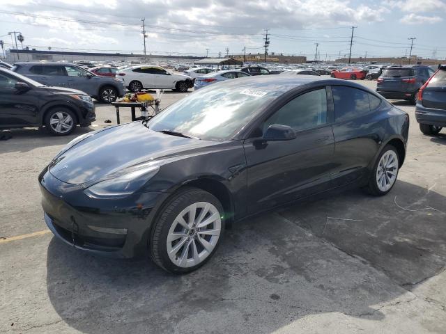 TESLA MODEL 3 2022 with VIN 5YJ3E1EB7NF299557 - Photo from auction