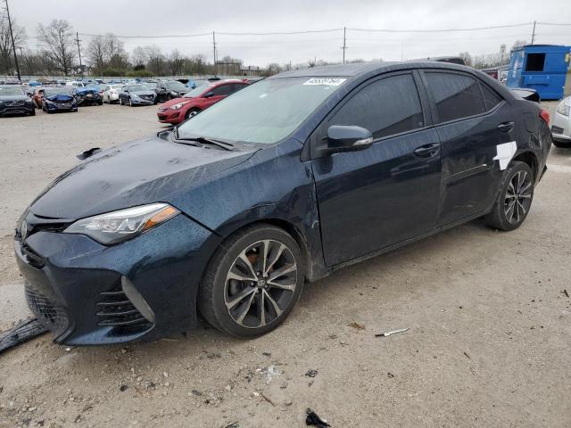 TOYOTA COROLLA L 2017 with VIN 5YFBURHE8HP648852 - Photo from auction