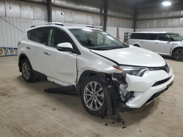Photo 4 from auction – 2016 TOYOTA RAV4 LIMIT with VIN JTMDFREV6GJ061138