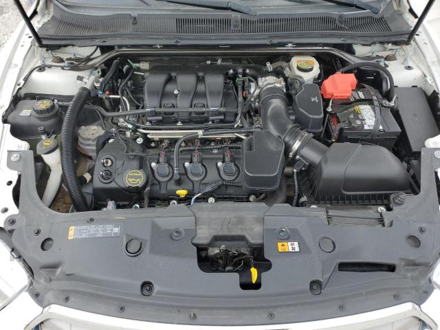 Photo 11 from auction – 2014 FORD TAURUS SEL with VIN 1FAHP2H84EG141047