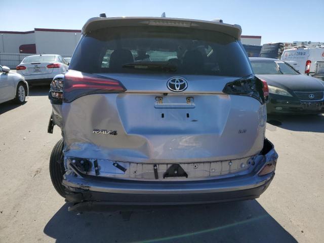 Photo 6 from auction – 2018 TOYOTA RAV4 LE with VIN JTMZFREV2JJ178471