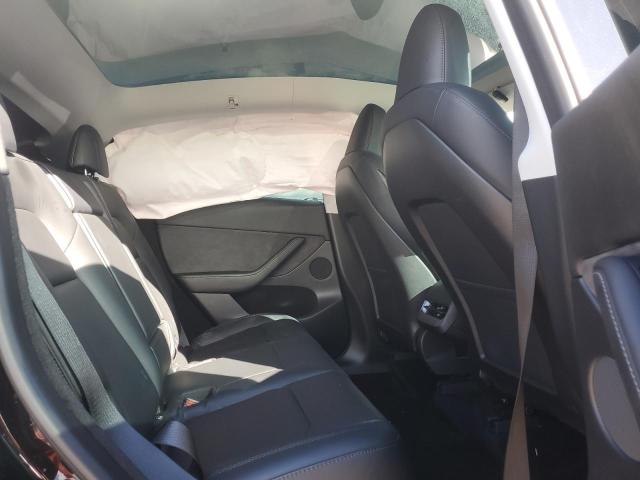 Photo 10 from auction – 2023 TESLA MODEL Y with VIN 7SAYGDEE6PA057535
