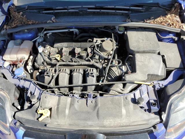 Photo 11 from auction – 2014 FORD FOCUS TITA with VIN 1FADP3J23EL130848