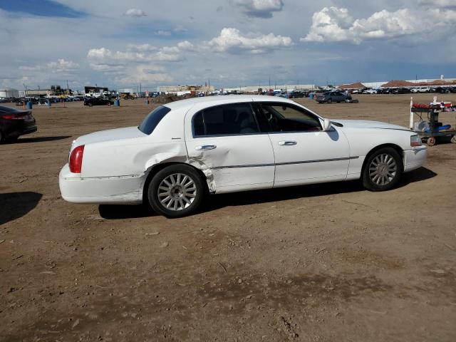 Photo 3 from auction – 2003 LINCOLN TOWN CAR E with VIN 1LNHM81W83Y618676
