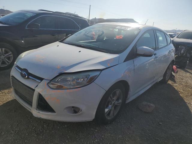 FORD FOCUS SE 2014 with VIN 1FADP3K20EL311856 - Photo from auction