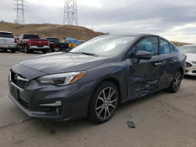 SUBARU IMPREZA LI 2018 with VIN 4S3GKAU61J3622281 - Photo from auction