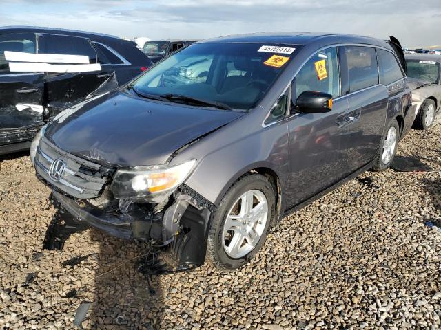 HONDA ODYSSEY TO 2012 with VIN 5FNRL5H90CB093297 - Photo from auction